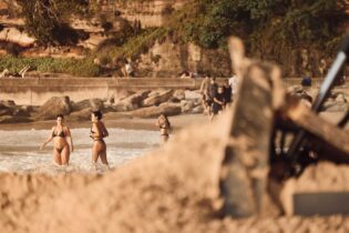 The Dozer still rearranging the beach at Bondi.